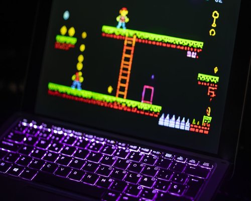 Smartphone displaying the fictional Crown Pixel Foundry game on PixelCrownForge Australia